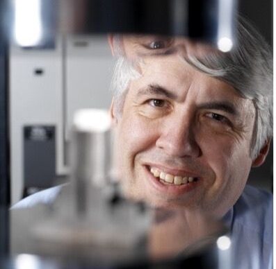 Headshot of Mark Gee in a lab setting